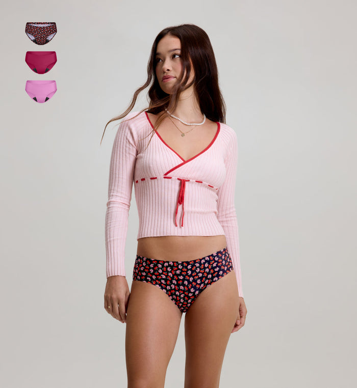 | Front view of model wearing the Teen Leakproof UltraThin No-Show Bikini highlighting the coverage and smooth fit | Ruby/Sugar Plum/Posy