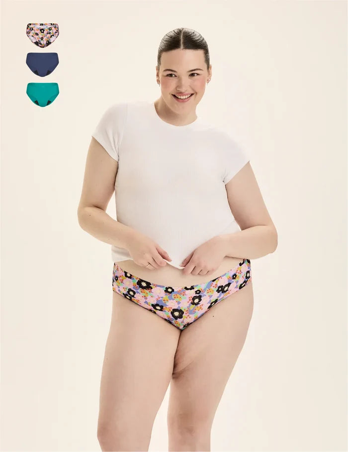 | Front view of model wearing the Teen Light Leakproof No-Show Bikini highlighting the coverage and smooth fit | Electric Orchid/Teal Appeal/Lagoon
