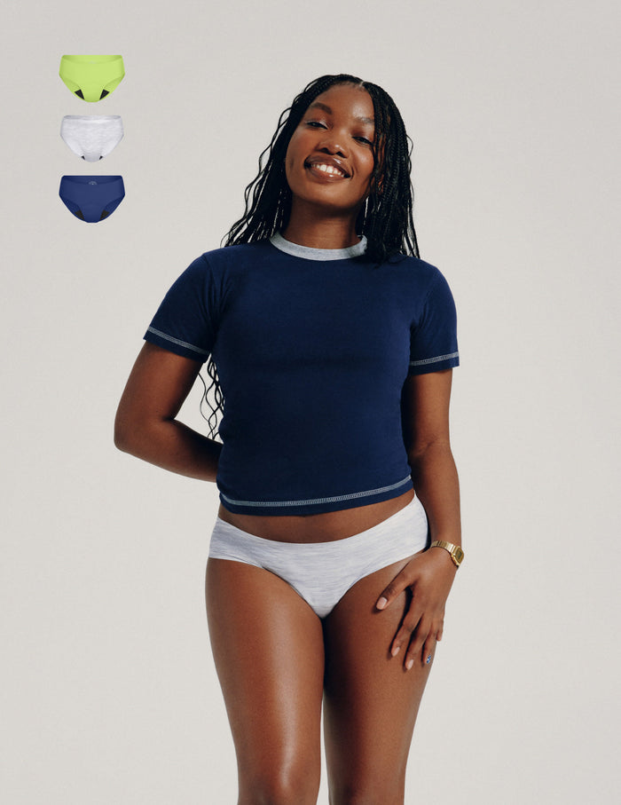 | Front view of model wearing the Teen Light Leakproof No-Show Bikini highlighting the coverage and smooth fit | Night Sky/Limeade/Heather Grey