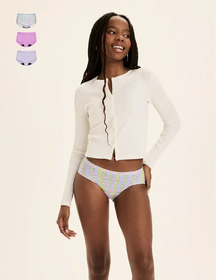 | Front view of model wearing the Teen Light Leakproof No-Show Boyshort highlighting the coverage and smooth fit | Picnic Plaid/Cosmo/Ultra Violet