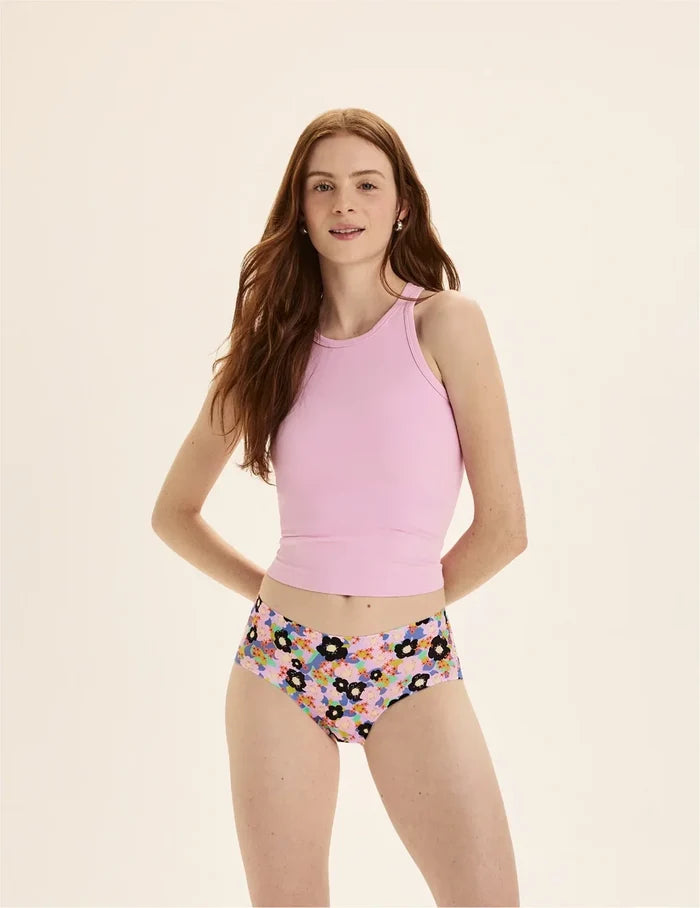 | Front view of model wearing the Teen Light Leakproof No-Show Boyshort highlighting the coverage and smooth fit | Electric Orchid