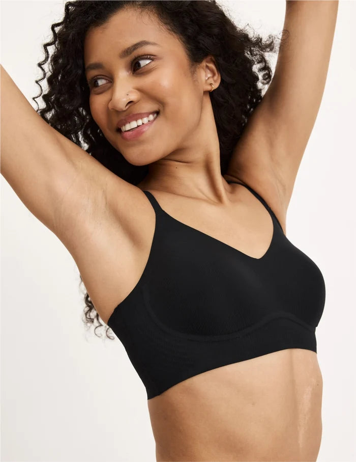 | Front view of model wearing the Teen On-The-Daily Bra, highlighting the neckline, pullover design, and silhouette | Black