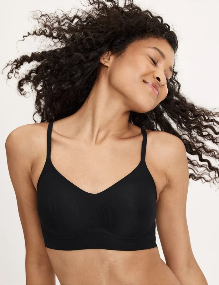 | Front view of model wearing the Teen On-The-Daily Bra, highlighting the neckline, pullover design, and silhouette | Black