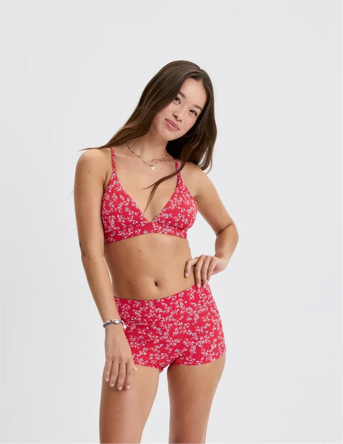 | Front view of model wearing the Teen Period Swim Short highlighting the coverage and fit | Poppy Petal