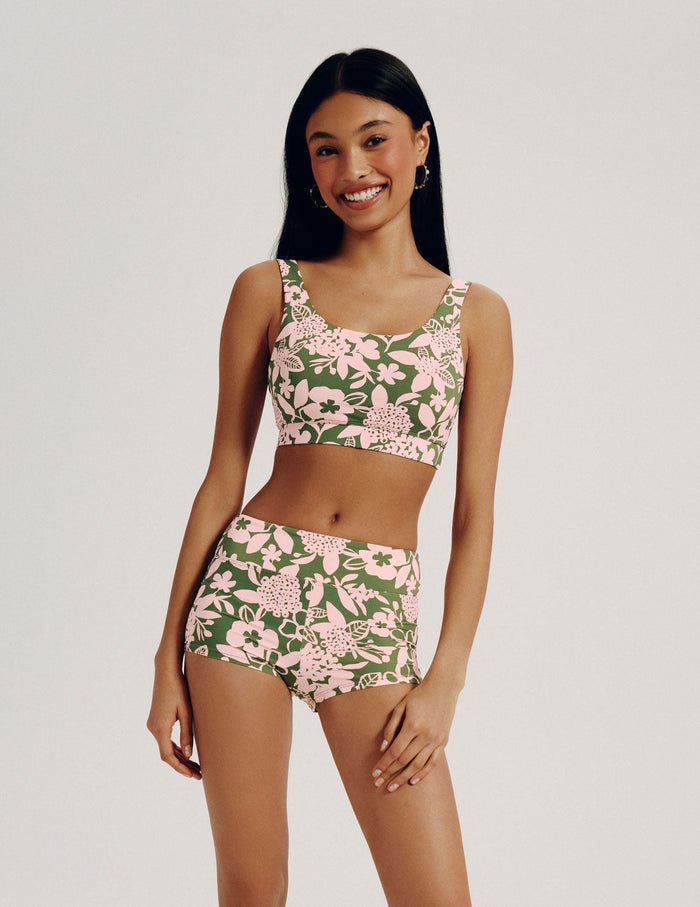 | Front view of model wearing the Teen Period Swim Short highlighting the coverage and fit | Tropical Punch