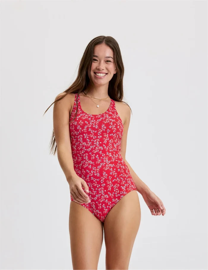 | Front view of model wearing the Teen Period Swim Sport One-Piece highlighting the coverage and fit | Poppy Petal