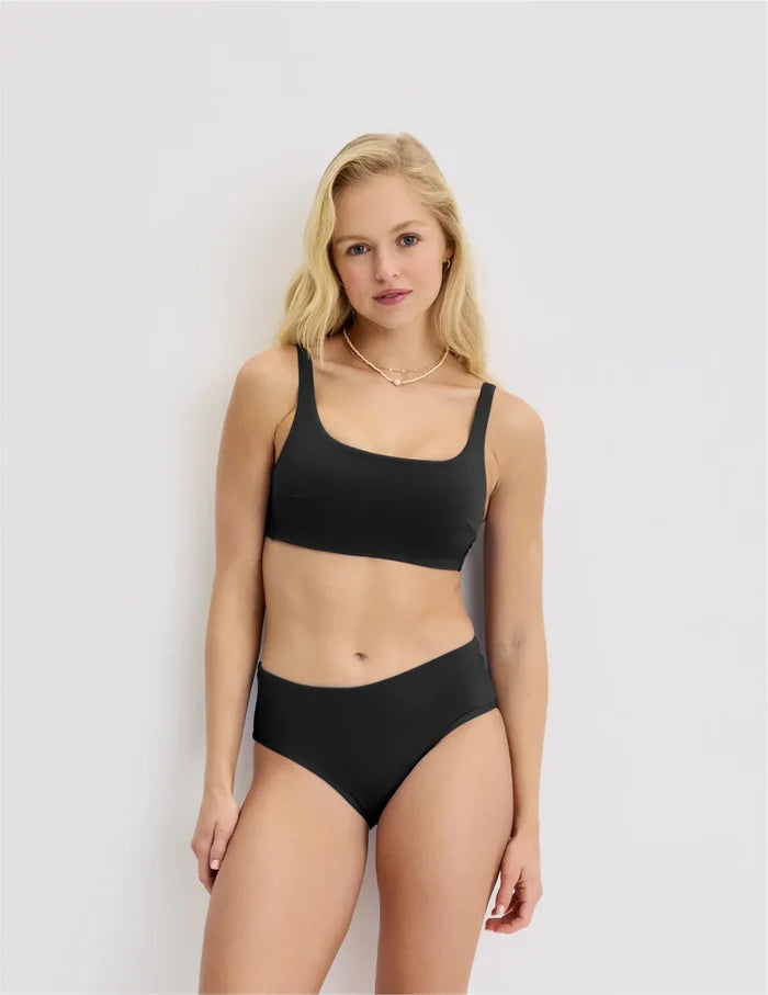 | Front view of model wearing the Teen Square Neck Scoop Bikini Top highlighting the coverage and fit | Black