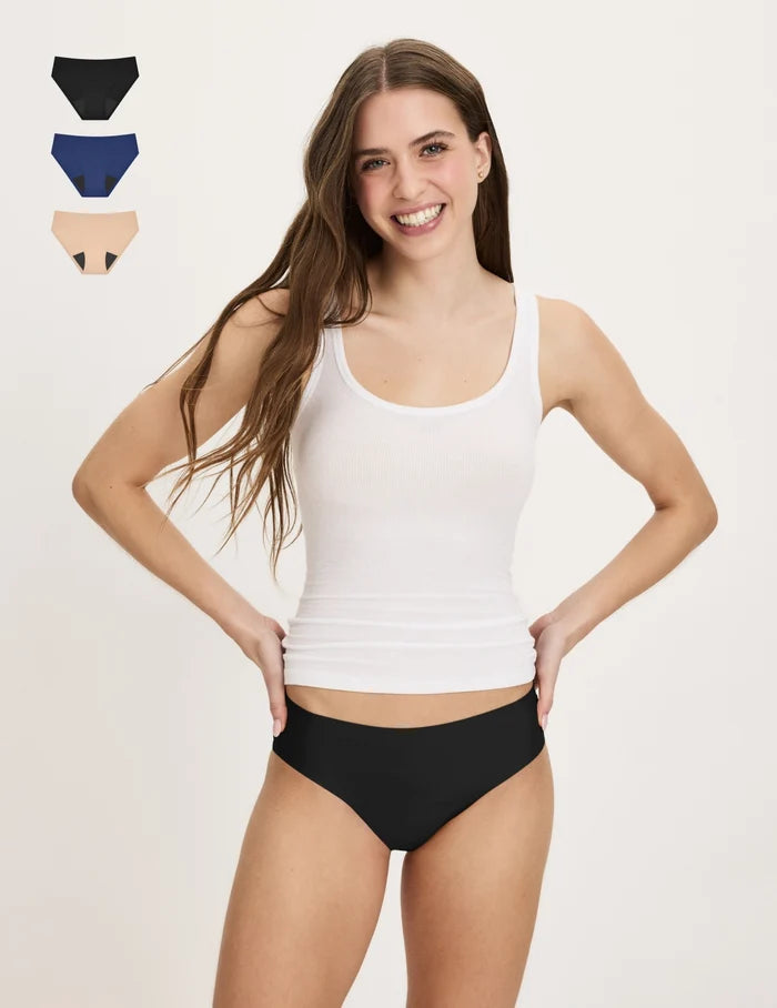 | Front view of model wearing the Teen Super Leakproof® No-Show Bikini highlighting the coverage and smooth fit | Night Sky/Beige/Black