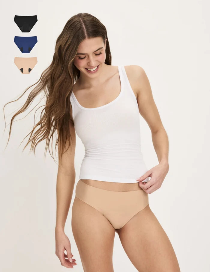 | Front view of model wearing the Teen Super Leakproof® No-Show Bikini highlighting the coverage and smooth fit | Night Sky/Beige/Black