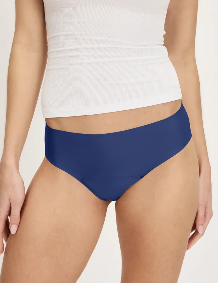 | Front view of model wearing the Teen Super Leakproof® No-Show Bikini highlighting the coverage and smooth fit | Night Sky