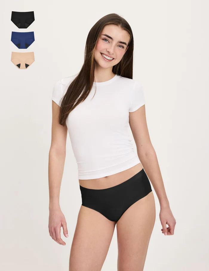 | Front view of model wearing the Teen Super Leakproof® No-Show Boyshort highlighting the coverage and smooth fit | Night Sky/Beige/Black