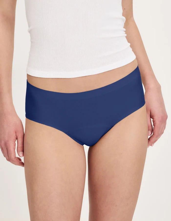 | Front view of model wearing the Teen Super Leakproof® No-Show Boyshort highlighting the coverage and smooth fit | Night Sky