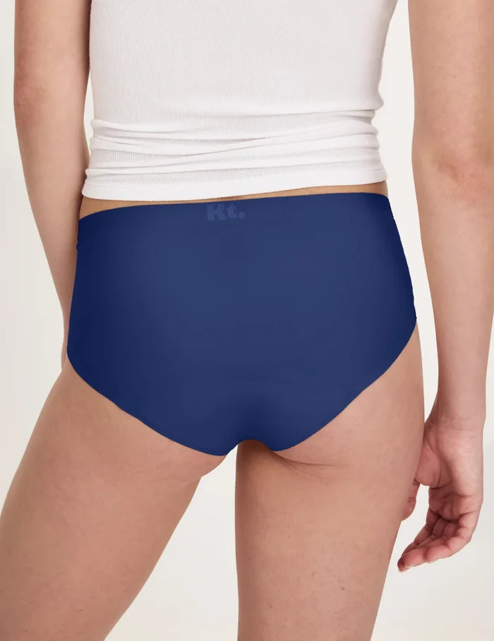 | Back view of model wearing the Teen Super Leakproof® No-Show Boyshort highlighting the coverage and smooth fit | Night Sky