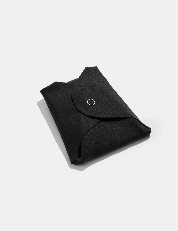 | Teen Super Leakproof Reusable Snap Pads shown front-facing against a light gray background | Black