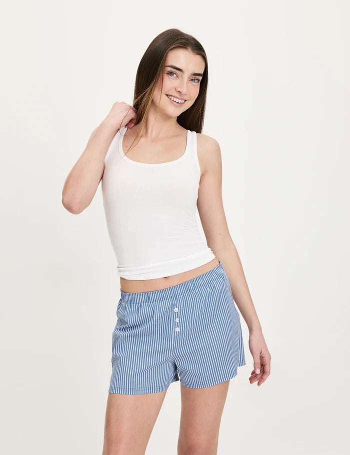 | Front view of model wearing the Teen Super Leakproof® Sleepover Boxer highlighting the coverage and fit | Blue Stripe