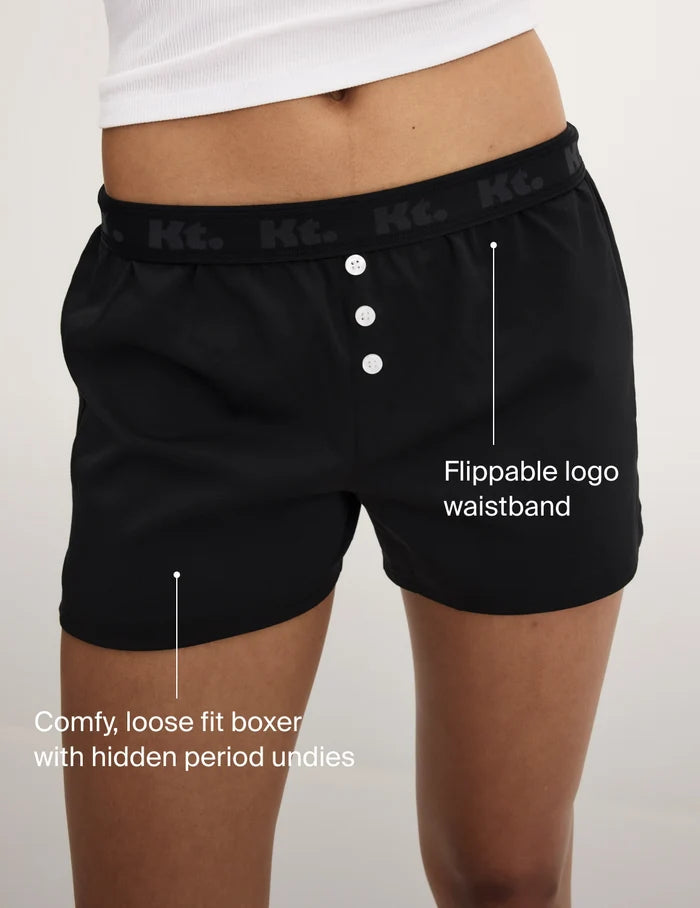 | Text on image: Flippable logo waistband. Comfy, loose fit boxer with hidden period undies | Black