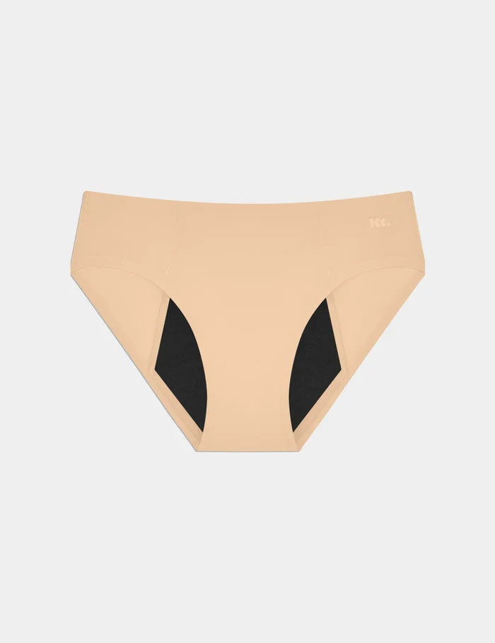 | Teen SuperPlus Leakproof® No-Show Bikini shown front-facing against a light gray background | Beige