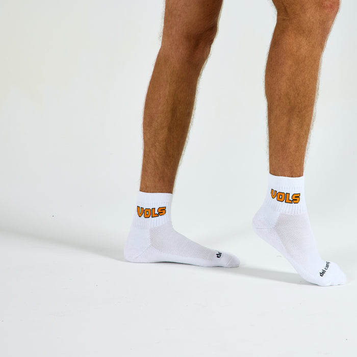 Man wearing Del Campo Tennessee Block golf socks, studio shot, no shoes