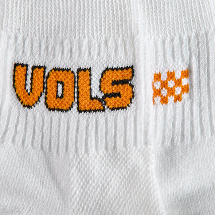 Close-up of the VOLS block wordmark on Del Campo Tennessee Pack golf socks