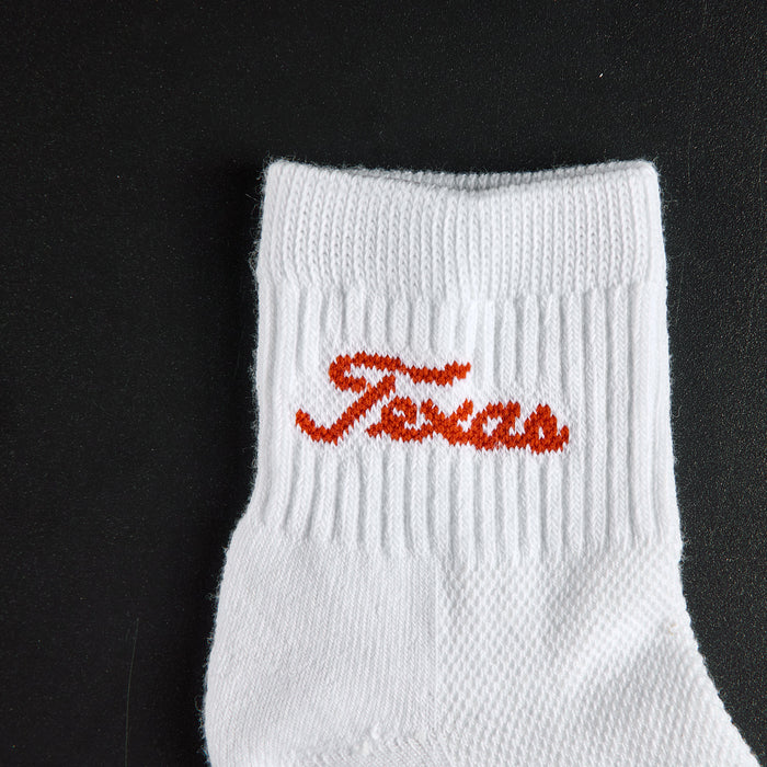 Del Campo Texas Longhorns Script golf socks, embroidered burnt orange Texas script wordmark detail