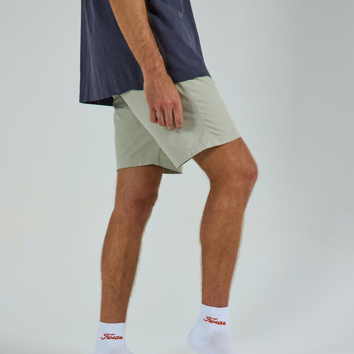 Del Campo Texas Longhorns Script golf socks on a male model in studio