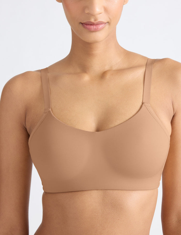 Tsanna is a 32C and wearing KNIX S | Front view of model wearing the One&Only Scoop Bra®, highlighting the neckline, strap design, and  silhouette | Cavassa