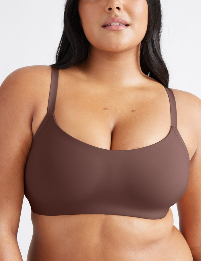 Adiya is a 36C and wearing KNIX L | Front view of model wearing the One&Only Scoop Bra®, highlighting the neckline, strap design, and  silhouette | Sable