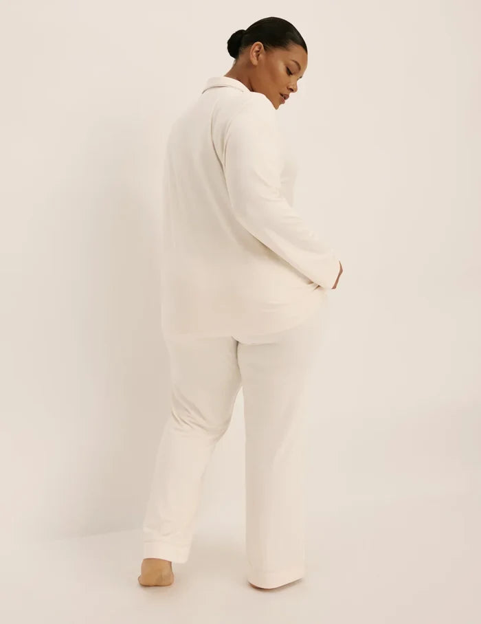 | Back view of model wearing the The Quintessential Sleep Set highlighting the coverage and fit | Ivory