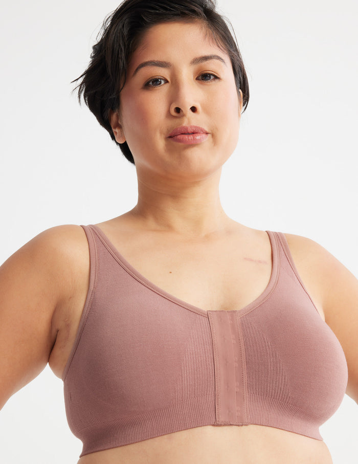 Denise is a customer and wears a Knix size M | Front view of model wearing the Ultra Soft Front Closure Bra, highlighting the neckline, easy front closure, and seamless knit silhouette | Bisque