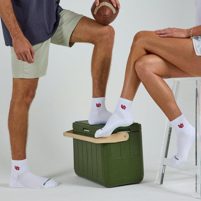 Del Campo Utah Utes golf socks on a male and female model