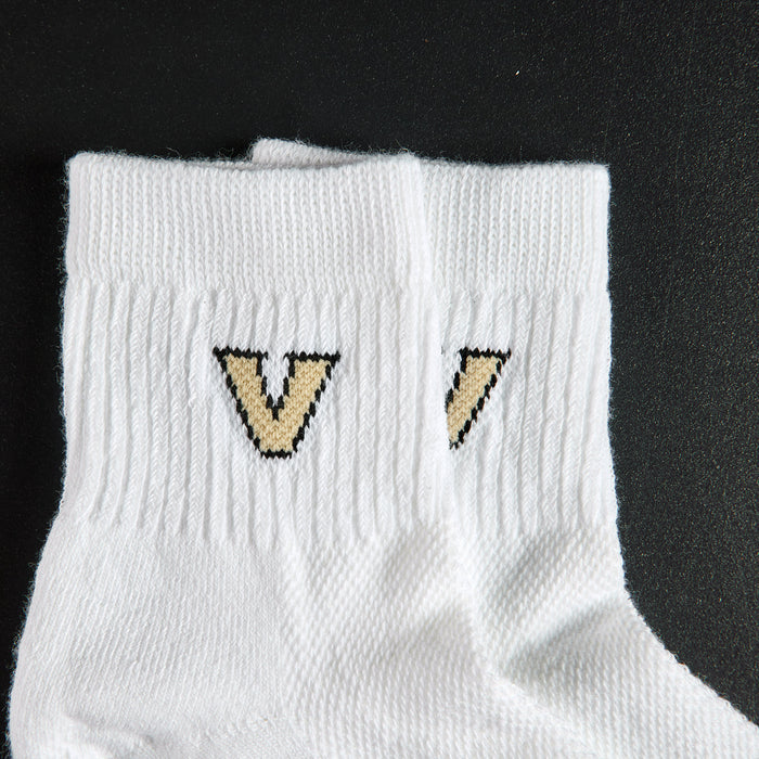 Close-up of the gold V on Del Campo Vanderbilt Commodores golf socks