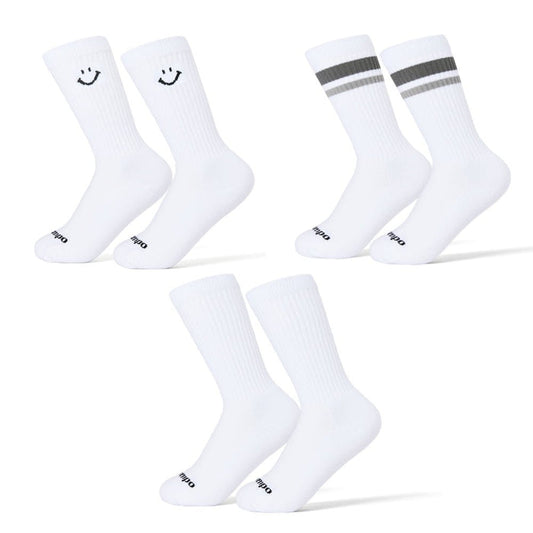 Del Campo Variety Crew 3-Pack golf socks featuring one grey stripe, one blank, and one smiley crew sock