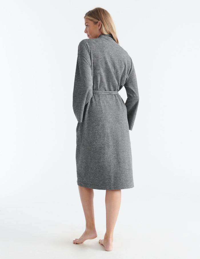 Amber is a 34DD and has 38" hips and wears a Knix size S/M/L | Back view of model wearing the Waffle Robe highlighting the coverage and fit | Dark Grey Marle