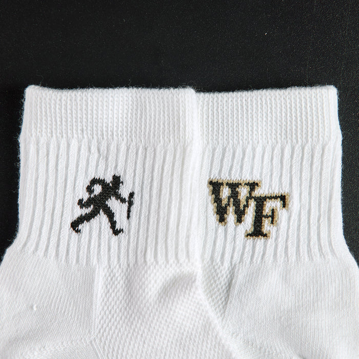 Close-up of the running Demon Deacon silhouette on Del Campo Wake Forest Walking Deacon golf socks
