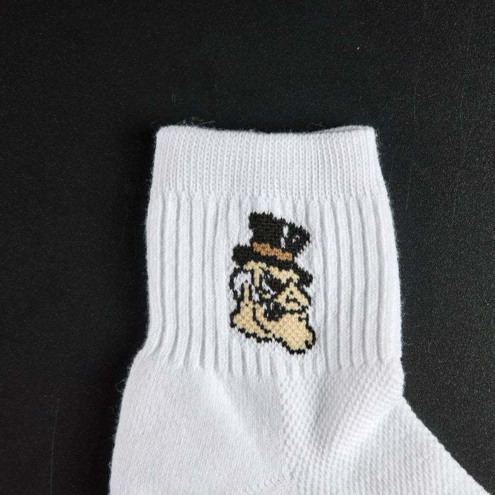 Close-up of the Demon Deacon head on Del Campo Wake Forest Demon Deacons golf socks