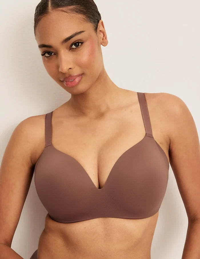 | Front view of model wearing the WingWoman Contour Bra, highlighting the neckline, strap design, and  silhouette | Sola