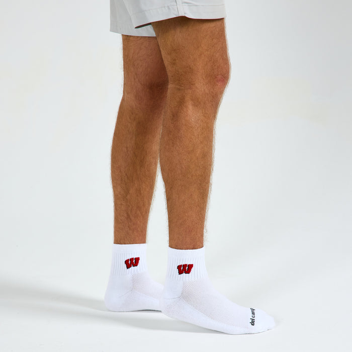 Man wearing Del Campo Wisconsin Badgers golf socks, studio shot, no shoes